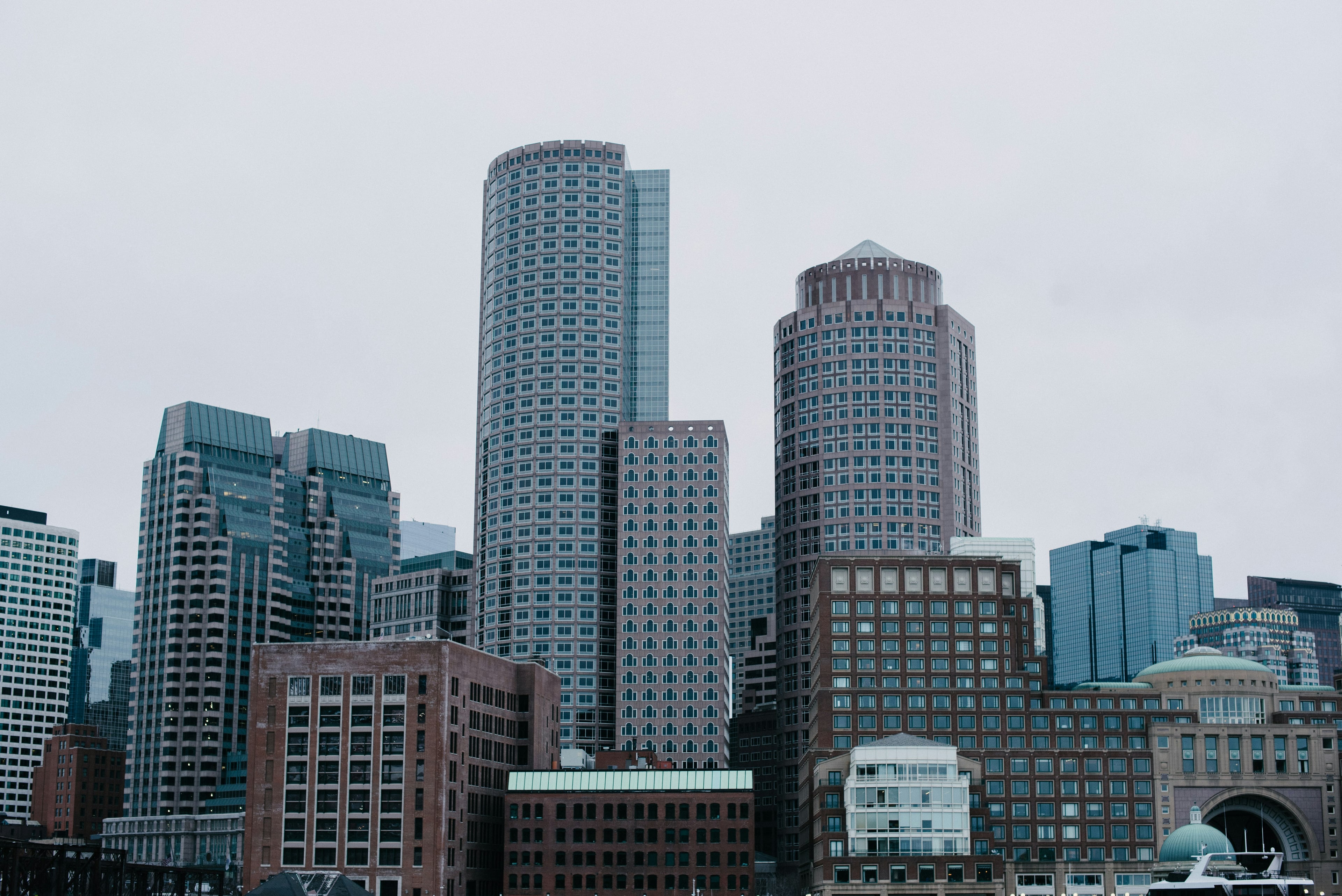 Blue glass towers photographed from below — Digital Weave Microsoft 365 consulting